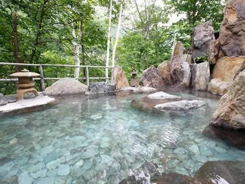Japanskt värdshus (ryokan) 層雲閣 Hotell Kamikawa